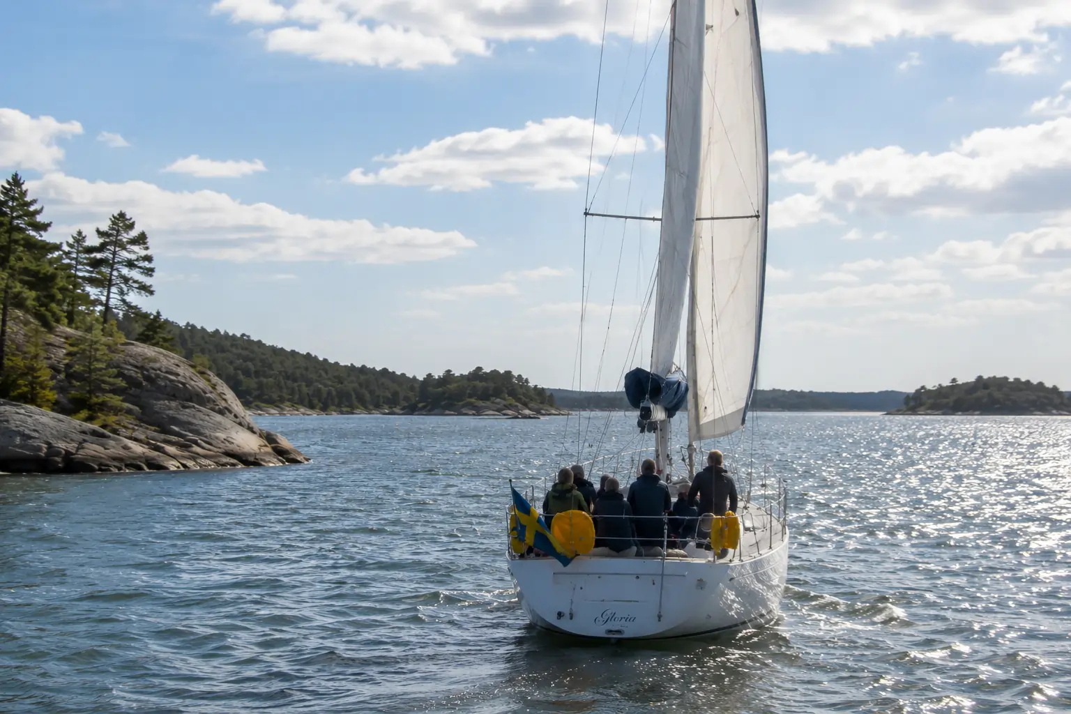 Sailing yacht with Swedish flag in the Stockholm Archipelago
