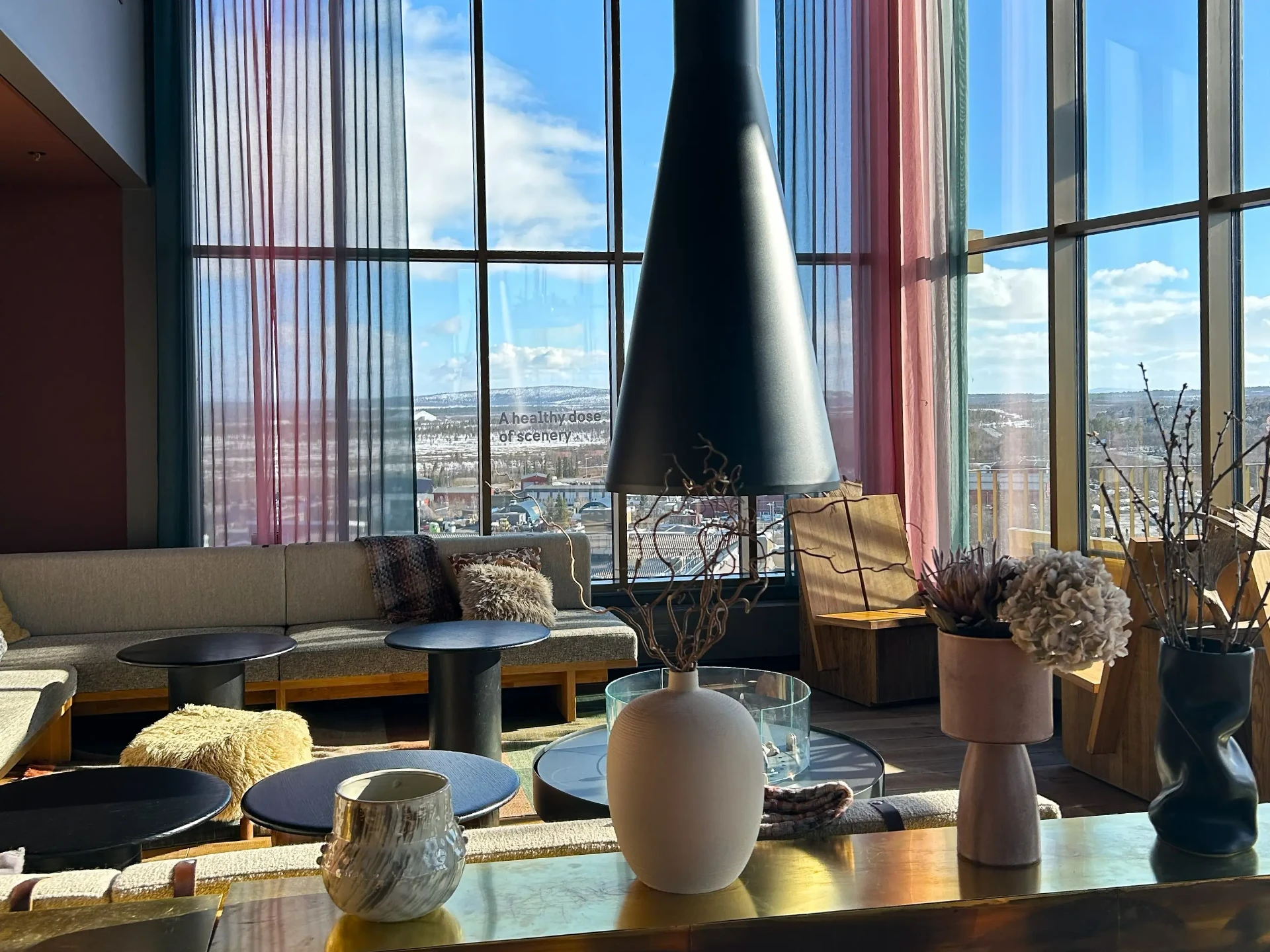 Hotel lounge in Kiruna with floor-to-ceiling Arctic views